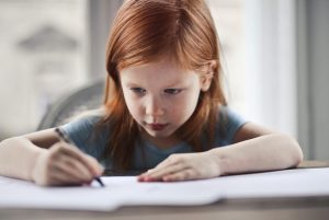 girl doing homework