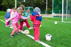 elementary kids playing soccer