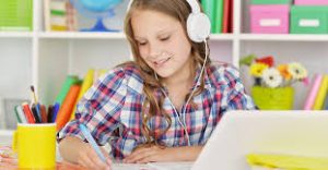 girl listening to computer